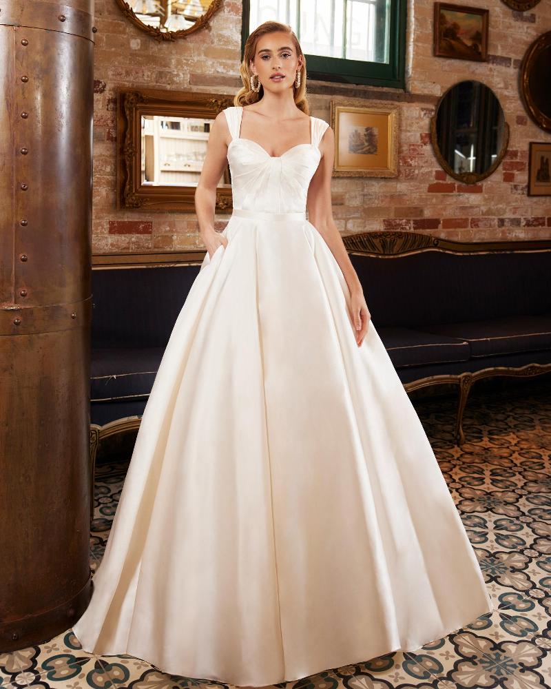La22233 satin ball gown wedding dress with pockets and buttons down the train3